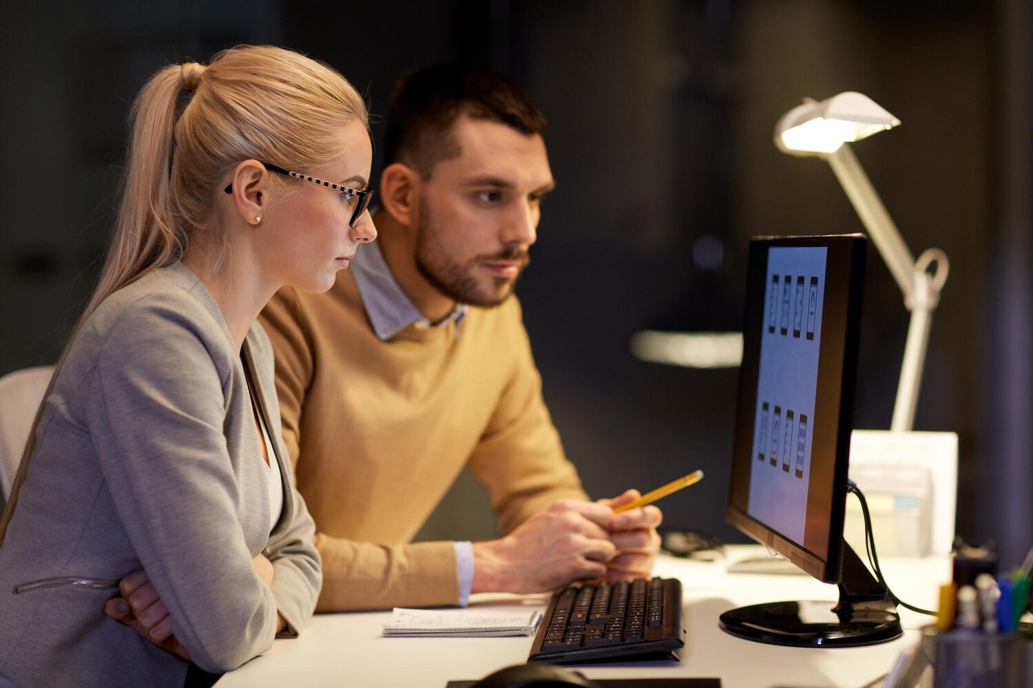 Developers collaborating on performance profiling to eliminate render‑blocking resources