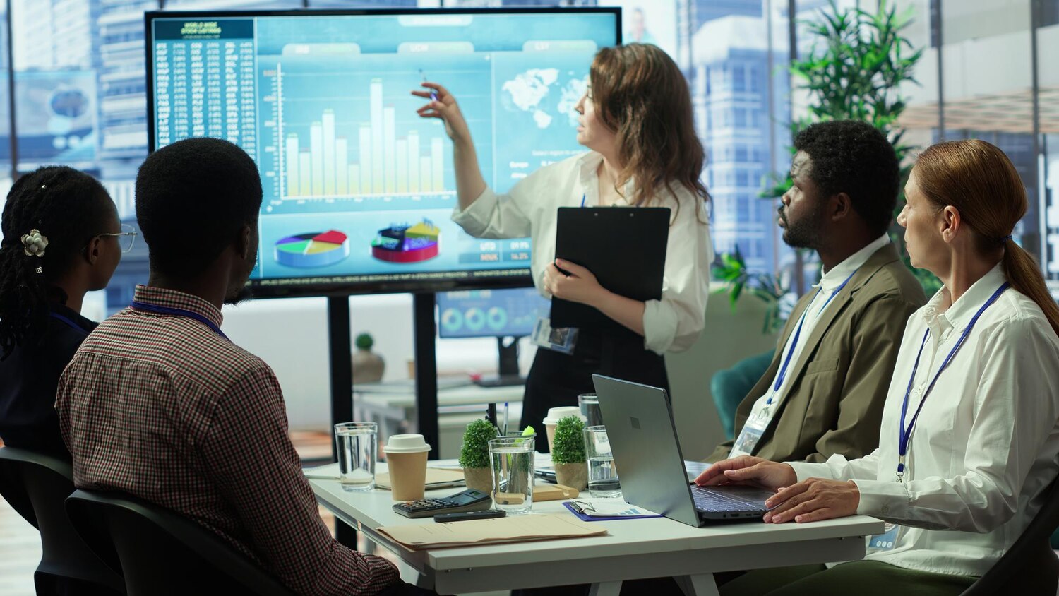 Product and data leads analyzing AI platform cost and latency dashboards to guide optimization