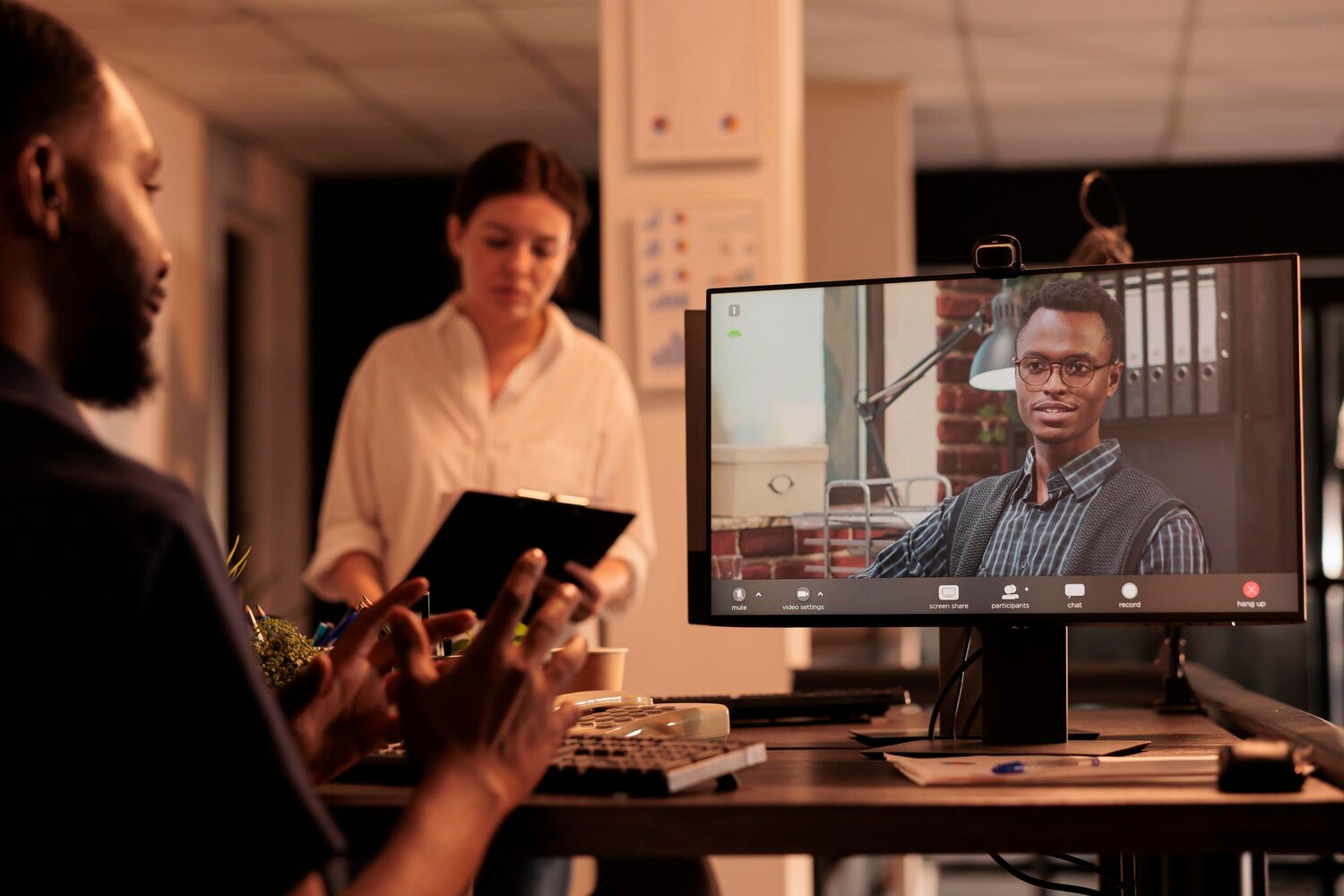Researchers and designers collaborating during a live usability test to locate conversion blockers