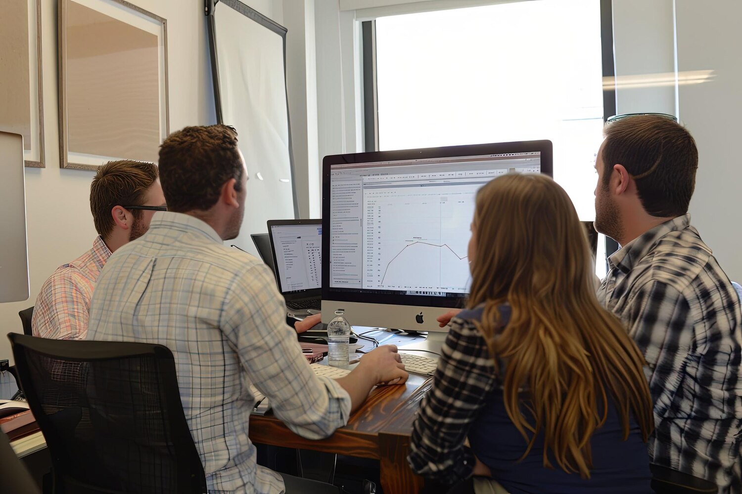 architect explaining build vs buy decisions for custom software development to a product team