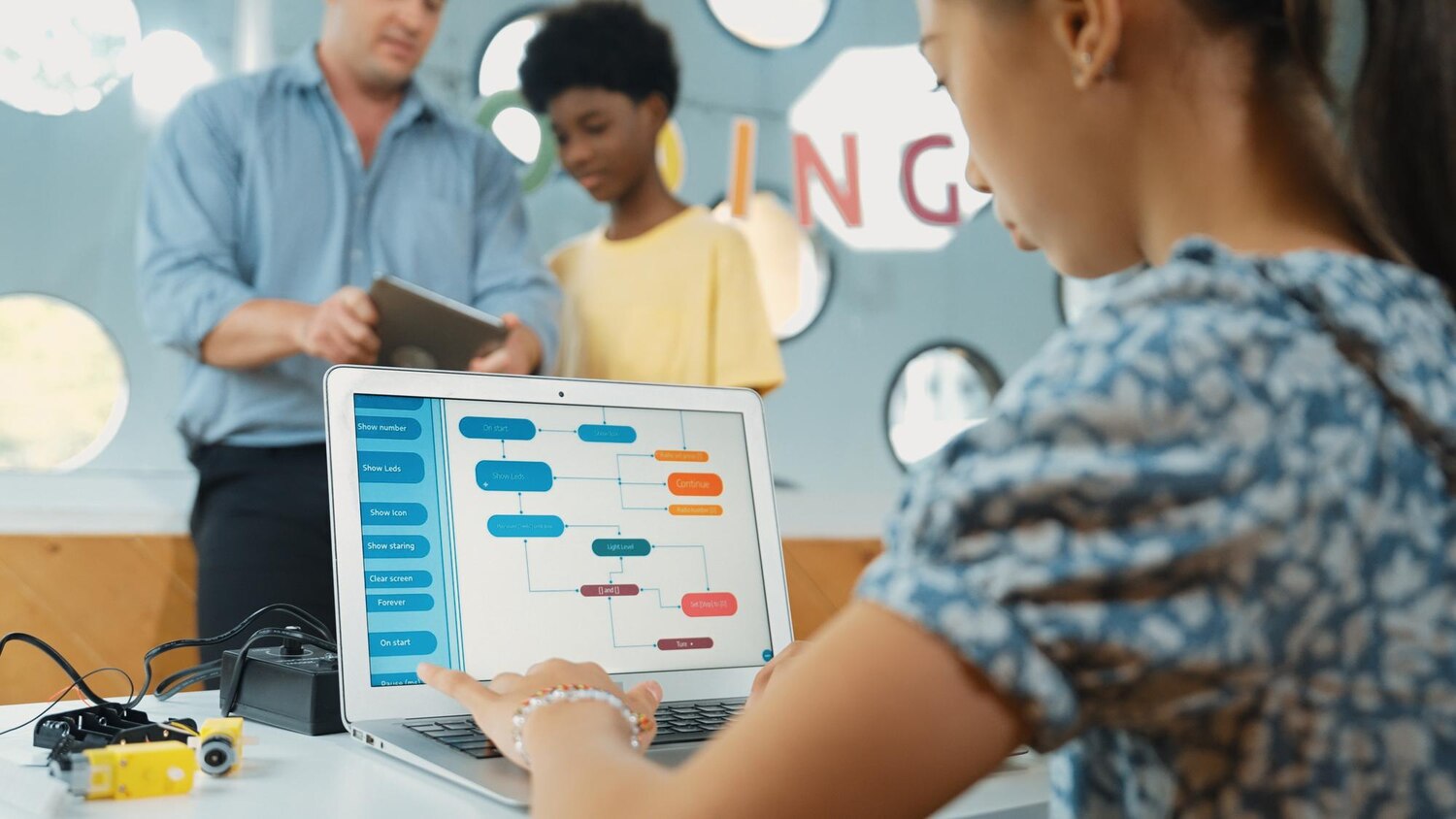 Integration engineers collaborating on SaaS API connections and queue-based workflows during sprint planning