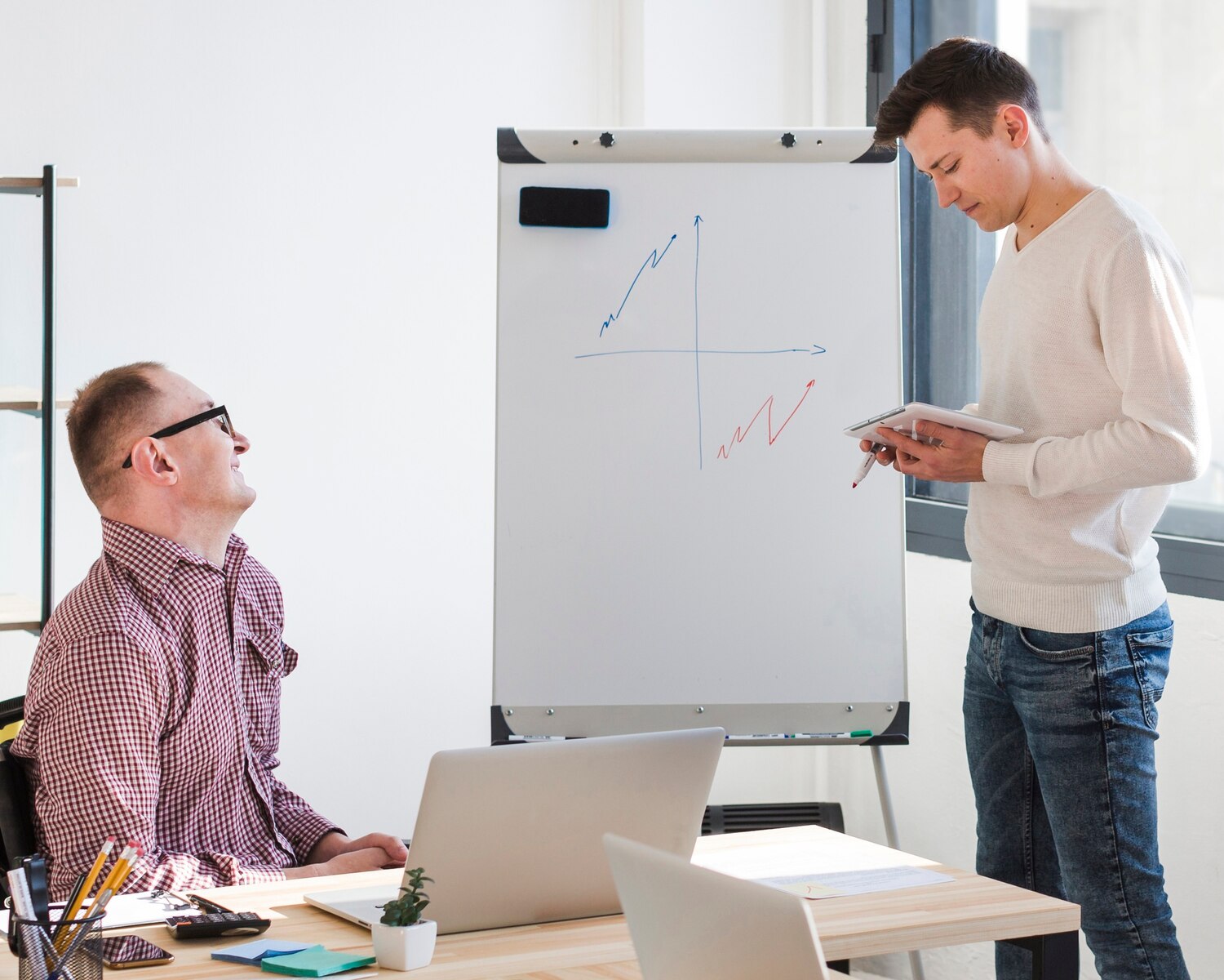Analytics lead and PM align on conversion KPIs and guardrail metrics for UX experiments
