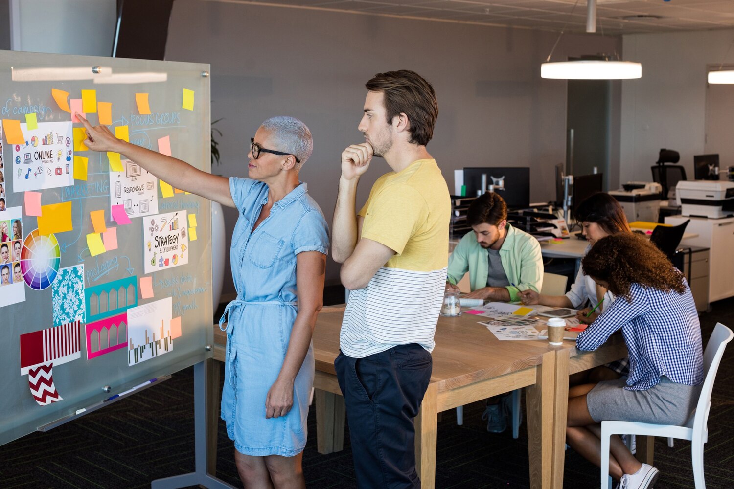 Cross-functional team collaborating on sprint planning for a bespoke platform