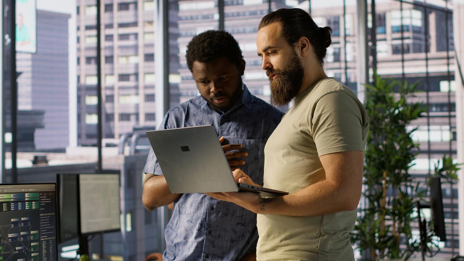 Engineers collaborating on event-driven integration workflows in a software workspace