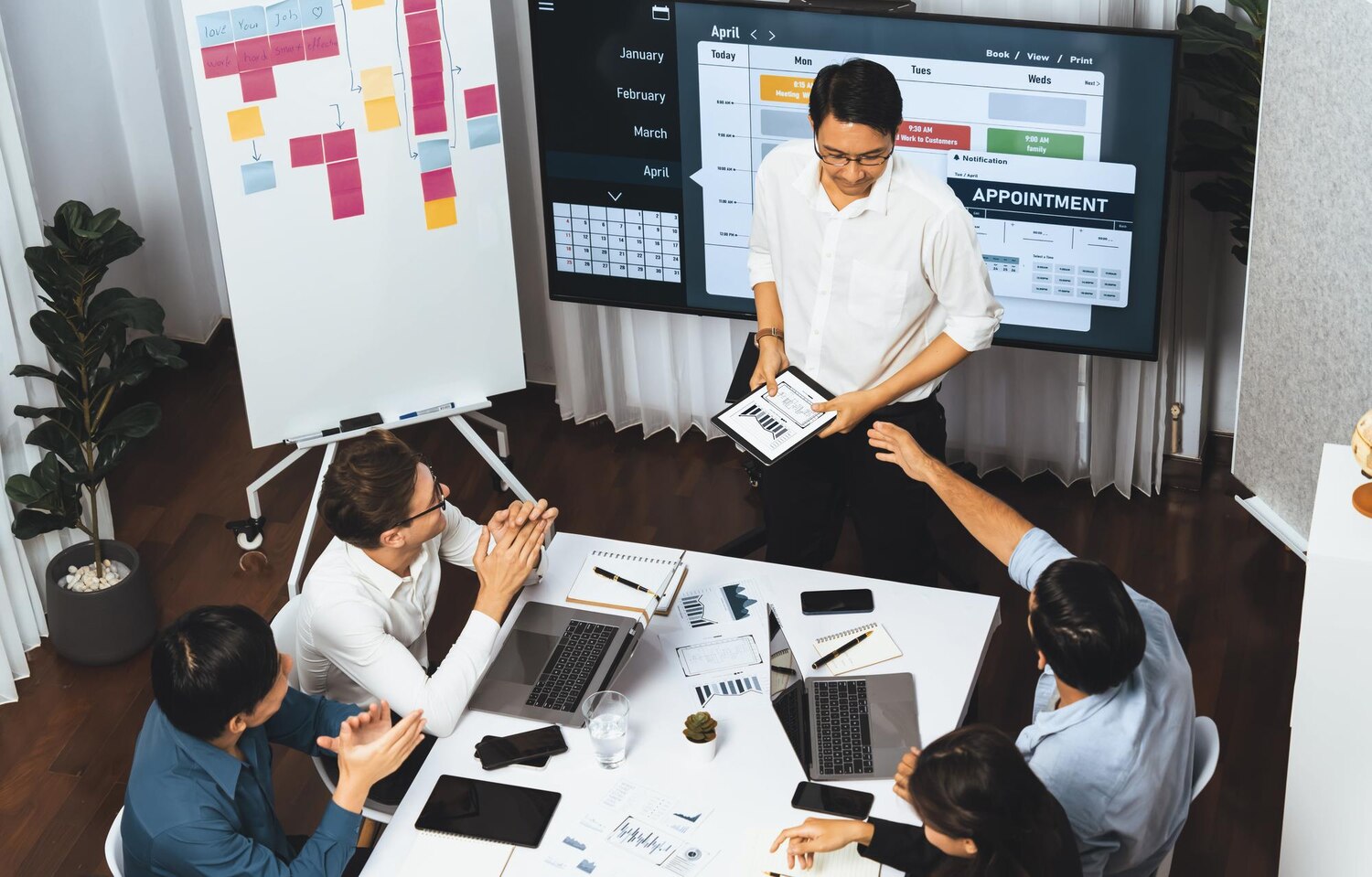 Team collaborating on backlog and scope for a custom software build