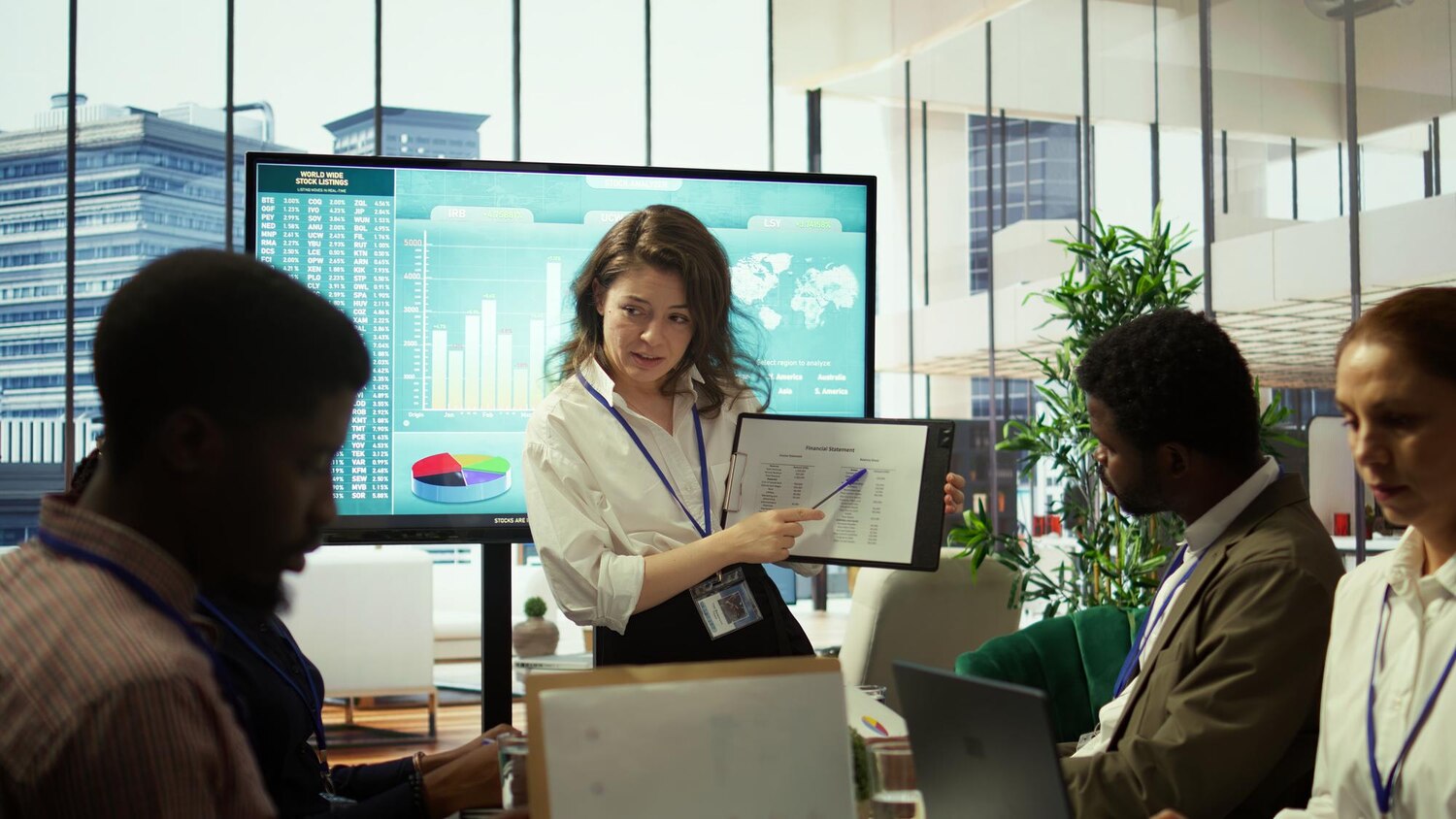Data scientist explaining a multi-touch attribution model to a marketing team in an analytics war room, highlighting decision paths