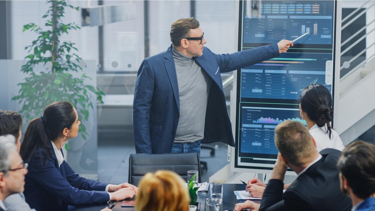 Product, data science, and risk leaders reviewing a model risk dashboard as part of Enterprise AI governance