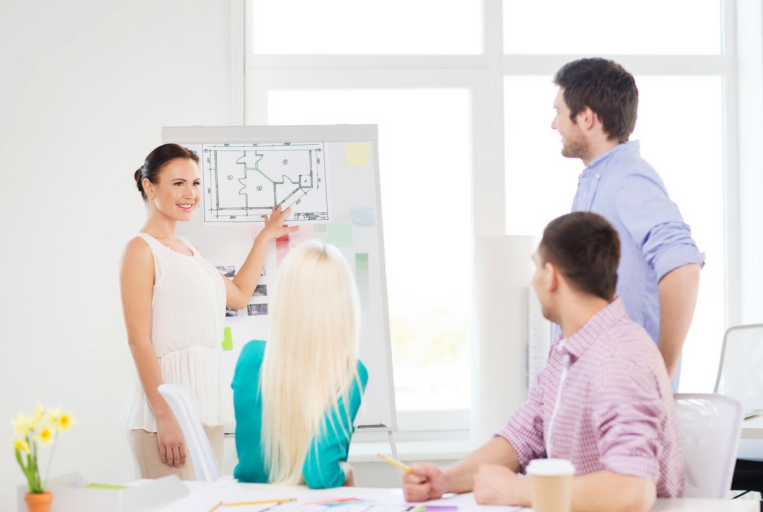 Cross-functional team collaborating on platform architecture for transformation