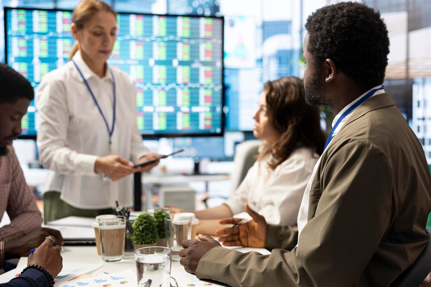 Executives and engineering leads analyzing options to refine the transformation roadmap priorities