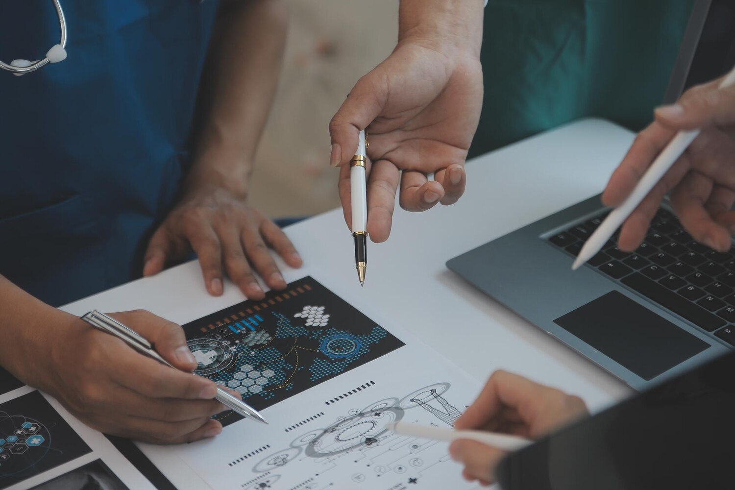 Designers and engineers align brand tokens with a product design system during a sprint