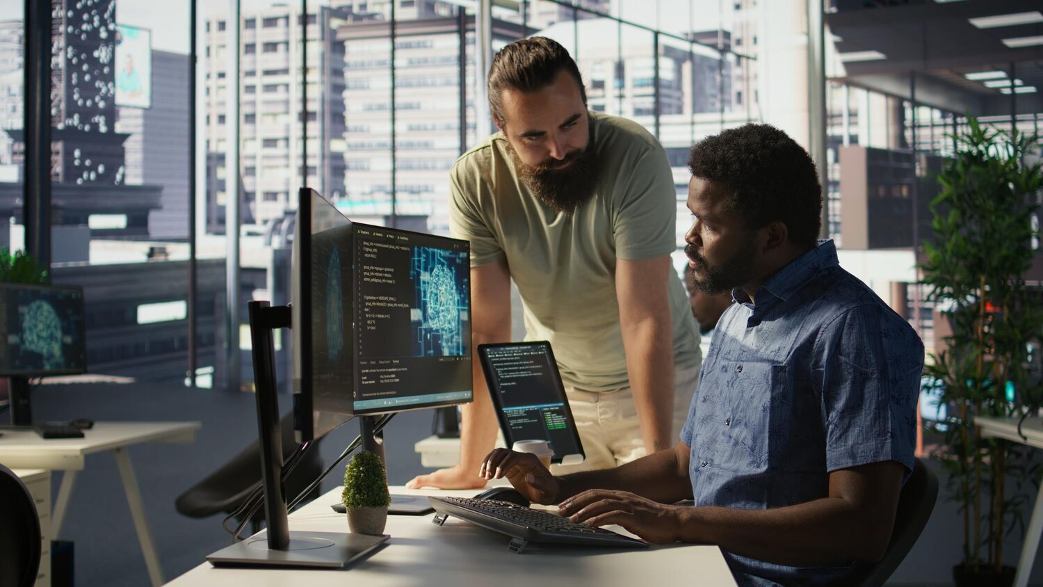 Developers pair programming on integrations during a sprint