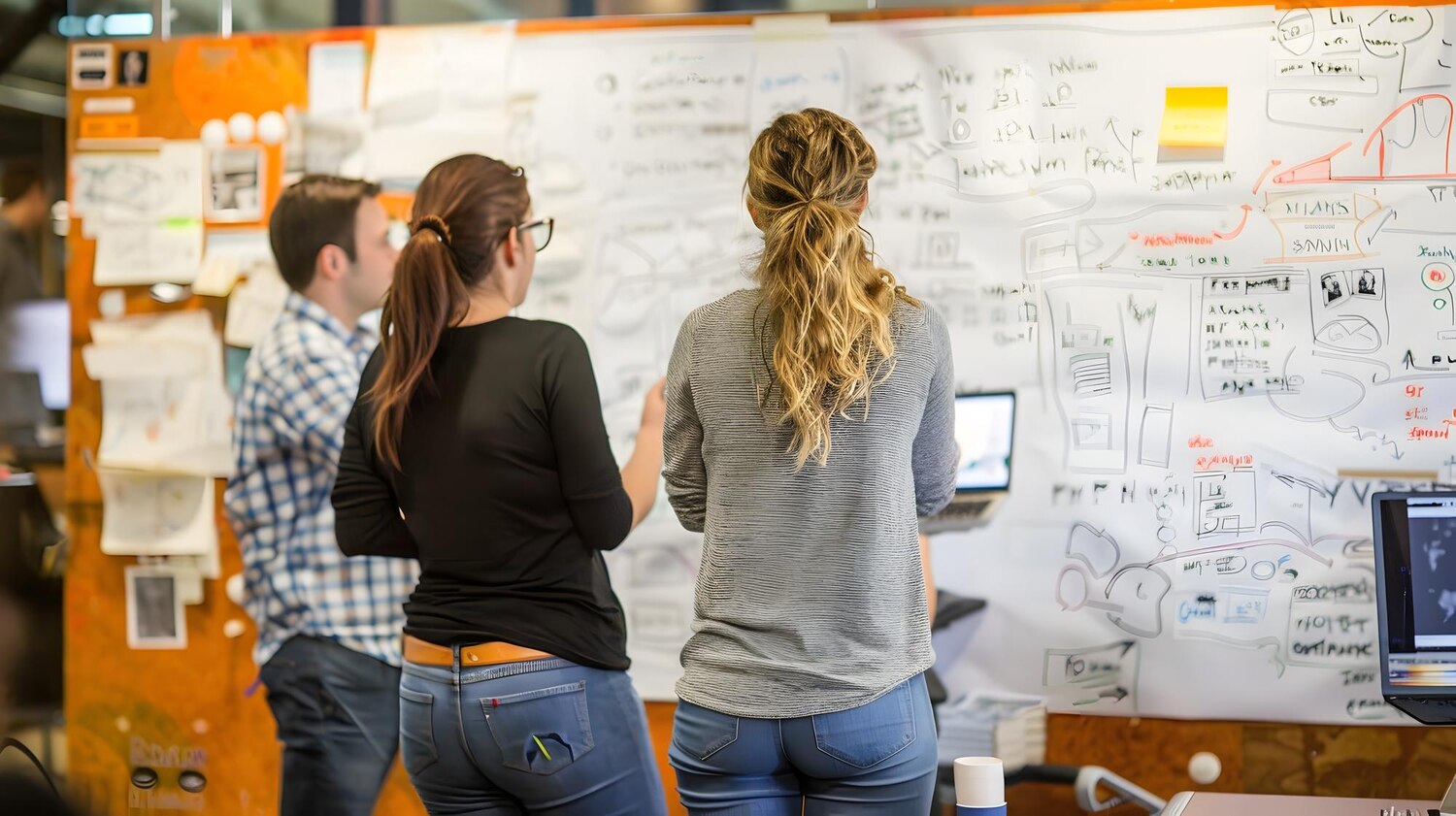 Cross-functional team aligning on funnel stages and success metrics
