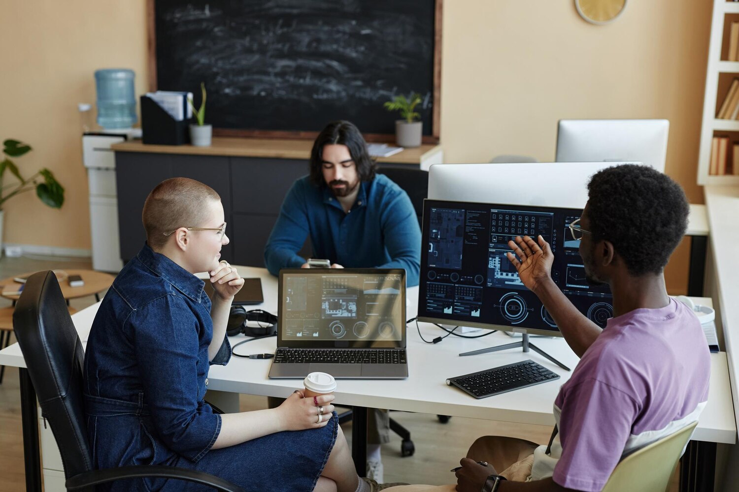 Engineers collaborating on integration pipelines and automated tests inside an iPaaS workspace