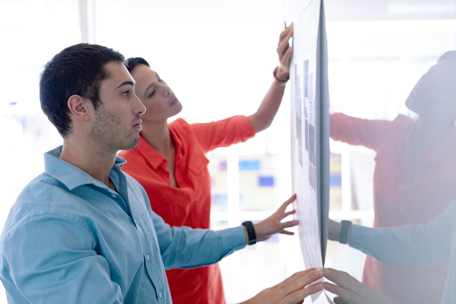 Architect walks a team through a build-buy-integrate decision for the transformation roadmap using a whiteboard matrix