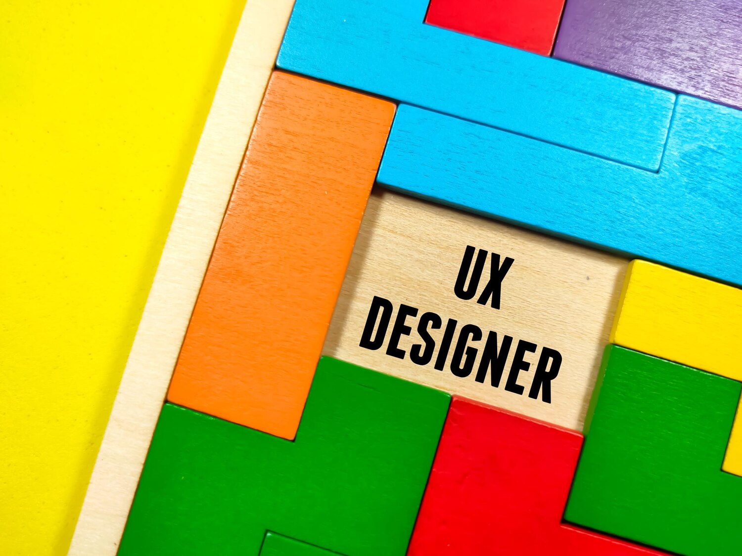 Designer documenting design tokens and type scales for a brand identity spec in a collaborative tool