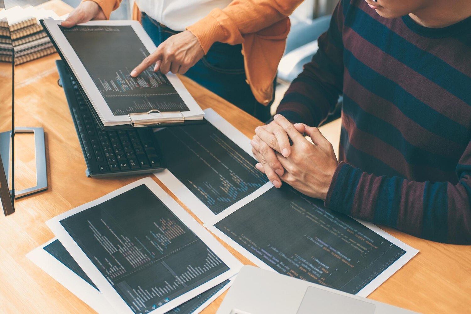 Engineer analyzing sequence diagrams and idempotency keys for stable automation flows